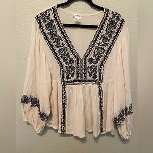 Beautiful long sleeve top with black embroidery